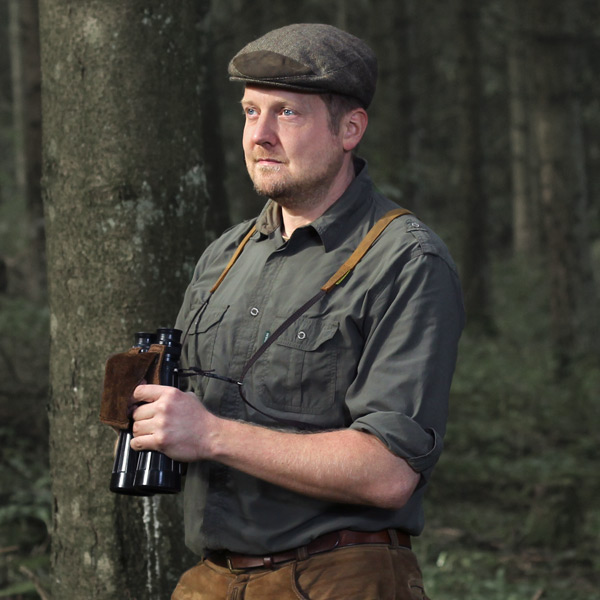 Huckepack Fernglasriemen Tragefoto Tragefoto des Fernglas-Riemens Huckepack